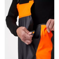 Alna 2.0 Regenlatzhose, Ebony/Hi-Vis Orange -Helly Hansen Workwear 132470 60